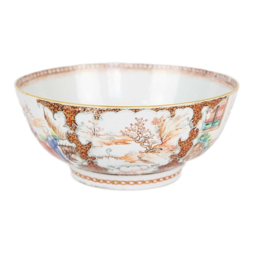 9 - A Chinese porcelain punch bowl, Qianlong period. Painted in the Mandarin palette and decorated with ... 