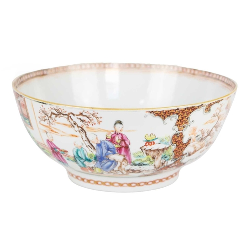 9 - A Chinese porcelain punch bowl, Qianlong period. Painted in the Mandarin palette and decorated with ... 