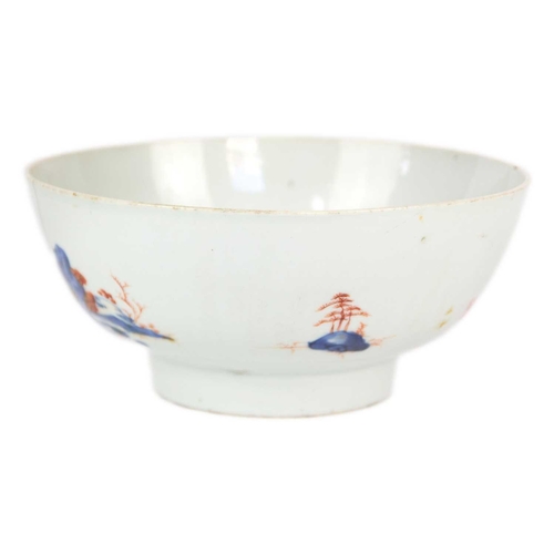 9 - A Chinese porcelain punch bowl, Qianlong period. Painted in the Mandarin palette and decorated with ... 