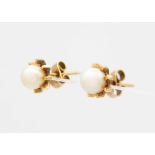 116 - An 18ct (tested) pearl set ring and a pair of 9ct pearl stud earrings. The ring with a broken shank,... 