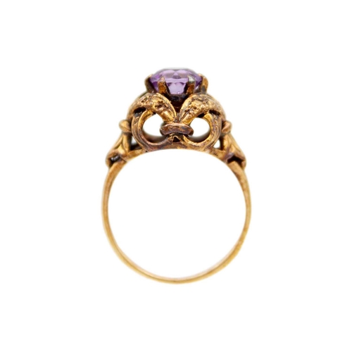 23 - Two 9ct hallmarked rose gold gem set rings. One set with a single round cut amethyst in a fancy open... 