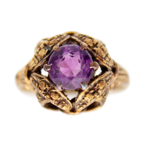 23 - Two 9ct hallmarked rose gold gem set rings. One set with a single round cut amethyst in a fancy open... 