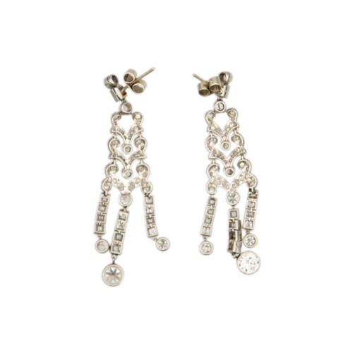 33 - A good pair of Art Deco 18ct white gold diamond set chandelier earrings. Each earring set with round... 