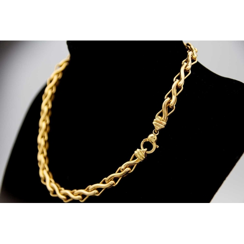 34 - A modern 18ct hallmarked gold fancy S link necklace. With hollow links, import hallmark London 1994,... 