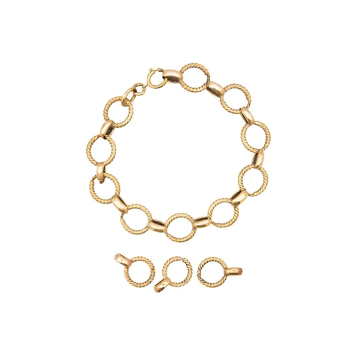 44 - A 9ct (tested) oval and circular twist link bracelet. The chain with three broken links, length 24, ... 