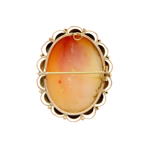 54 - A group of three 9ct jewels. To include a carved shell cameo brooch, 41 x 33mm, a hallmarked white o... 