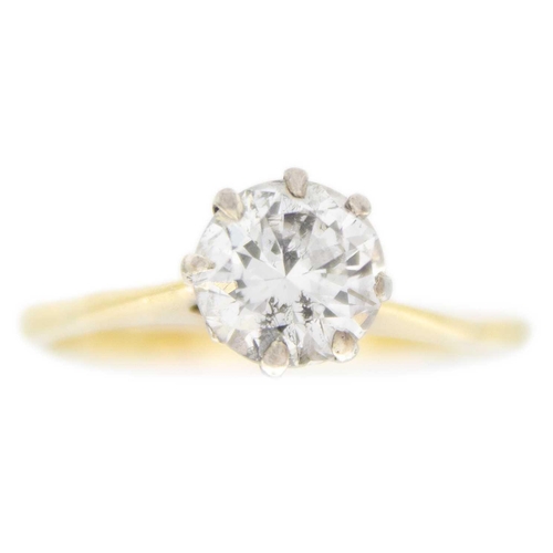 71 - An 18ct, 1.30ct (estimated) diamond solitaire ring. The round brilliant cut diamond of PK2 clarity a... 