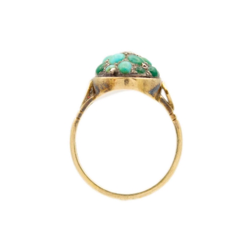 73 - A Victorian 9ct turquoise and diamond pavé set ring. Of domed form and with a central star set small... 