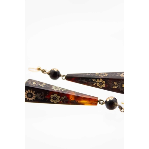 81 - A pair of Victorian pique tortoiseshell drop earrings of obelisk form. Gold and silver inlaid with g... 