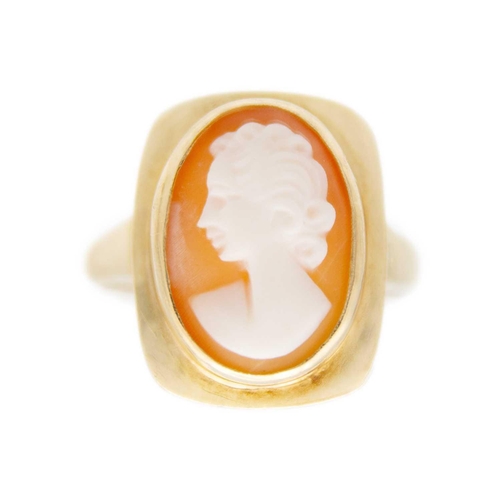 96 - A 9ct shell cameo ring and a pair of 9ct shell cameo earrings. The ring size M, total weight 5.6g.