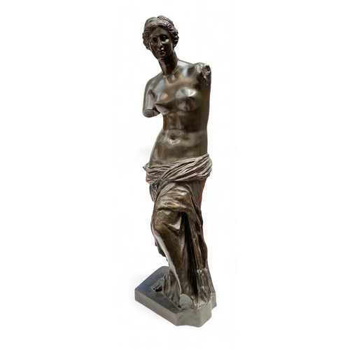 100 - A late 19th century French bronze figure of the Venus de Milo. Dark brown patination, stamped From L... 