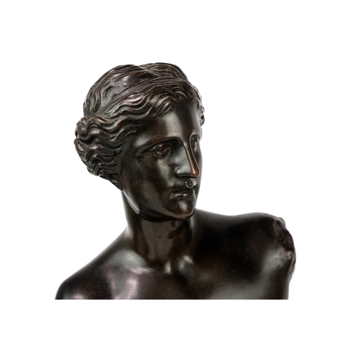 100 - A late 19th century French bronze figure of the Venus de Milo. Dark brown patination, stamped From L... 