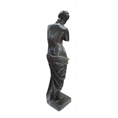 100 - A late 19th century French bronze figure of the Venus de Milo. Dark brown patination, stamped From L... 