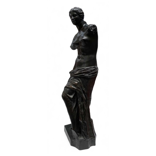 100 - A late 19th century French bronze figure of the Venus de Milo. Dark brown patination, stamped From L... 