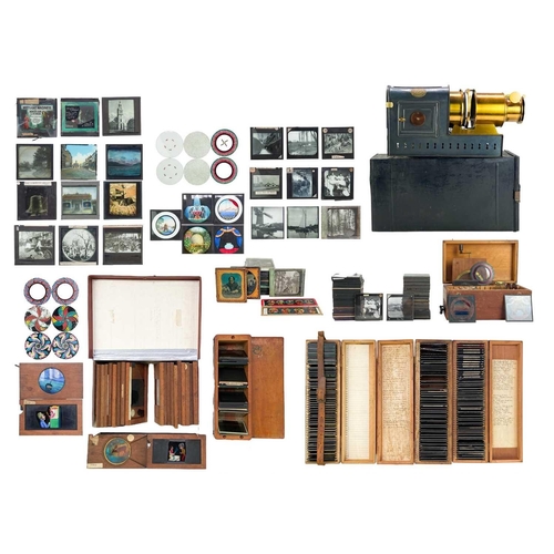 101 - A large collection of magic lantern slides, a Negretti & Zambra Magic Lantern and a pull-up screen. ... 