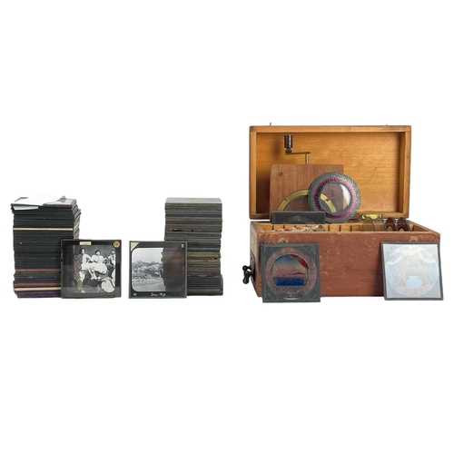 101 - A large collection of magic lantern slides, a Negretti & Zambra Magic Lantern and a pull-up screen. ... 