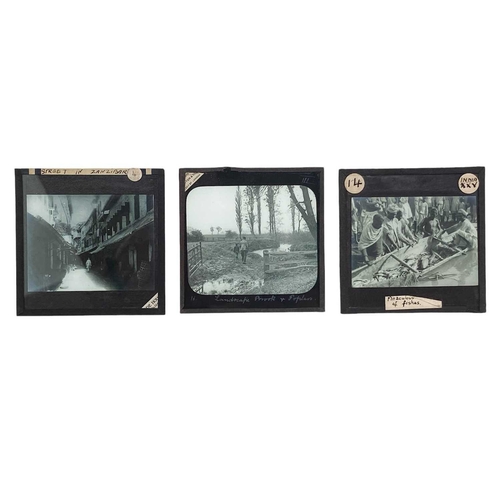 101 - A large collection of magic lantern slides, a Negretti & Zambra Magic Lantern and a pull-up screen. ... 