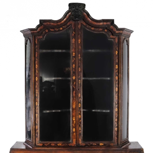 1013 - A Dutch walnut marquetry bureau bookcase. 18th century, the glazed upper part with angled sides and ... 