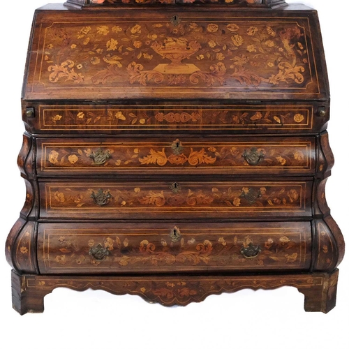 1013 - A Dutch walnut marquetry bureau bookcase. 18th century, the glazed upper part with angled sides and ... 