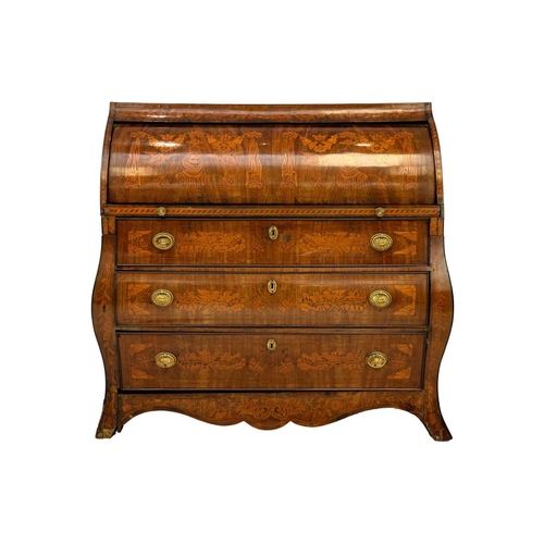 1015 - A Dutch mahogany and fruitwood marquetry bombe cylinder bureau. The roll top front extensively inlai... 