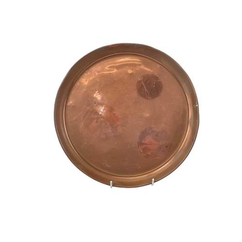 103 - Two copper trays, Hayle, possibly Eustace brothers. Engraved with galleons, the larger diameter 28.5... 