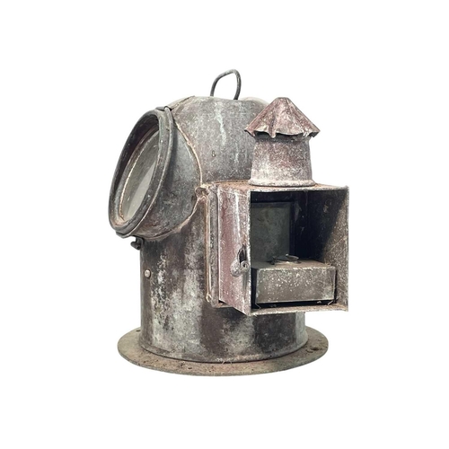 105 - A miner's lamp, labelled 3. Serial number 48136, height 26cm, together with a copper ships binnacle ... 