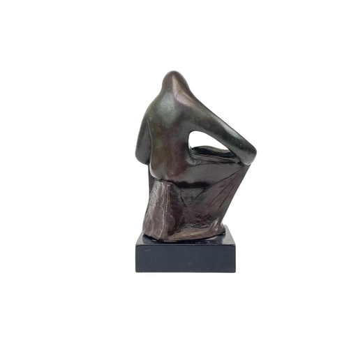 115 - A 20th century bronze model of a mother and baby. Signed monogram mounted on black fibreboard base, ... 