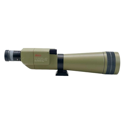 12 - A Kowa TSN-2 spotting scope. With a 20X-60X zoom lens, a green case, and also two tripods. The lens ... 