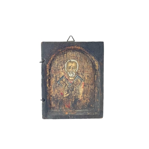 148 - A small Orthodox Icon. Probably from a triptych, 8.5cm x 7cm together with a modern Icon and a winge... 