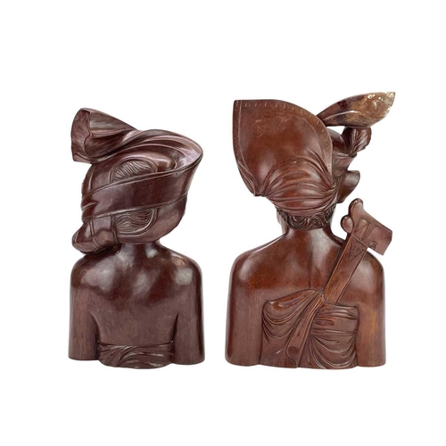 160 - A pair of Balinese hardwood carved busts. A. A Fatimah, height 38cm.