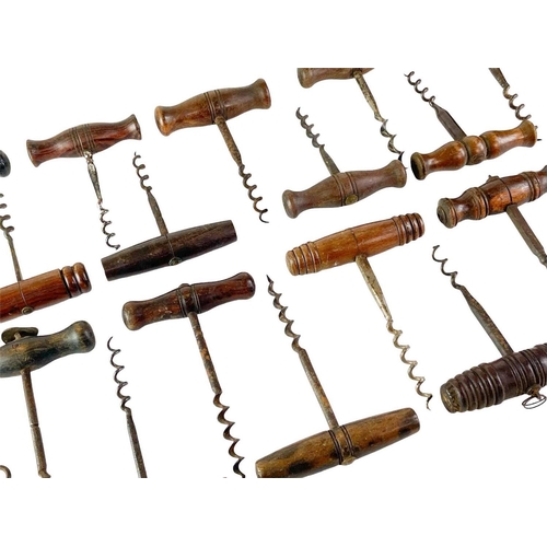 162 - A collection of various hardwood direct pull corkscrews. (18)