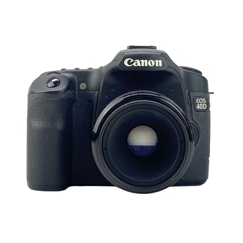 179 - A Canon EOS 40D camera body. Fitted with a Compact-Macro 50mm lens, together with a Canon D60 camera... 