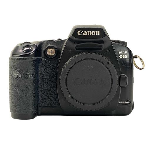 179 - A Canon EOS 40D camera body. Fitted with a Compact-Macro 50mm lens, together with a Canon D60 camera... 