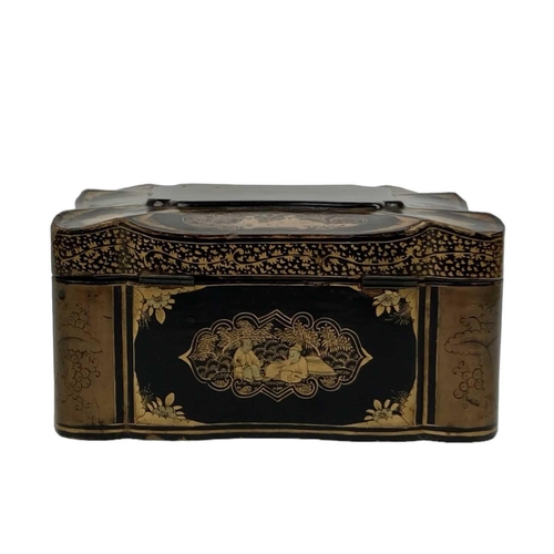 180 - A 19th century Chinese Export lacquer box. Of quatrefoil form decorated with figures within gardens,... 