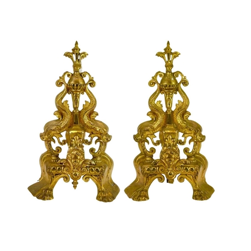 186 - A pair of French brass chenets, In Louis XVI style height 45cm.