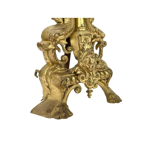 186 - A pair of French brass chenets, In Louis XVI style height 45cm.