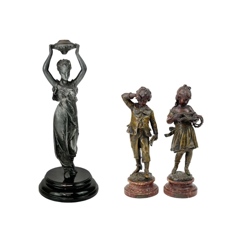 192 - A pair of French spelter figures of children. Late 19th century, titled 'Recompense' and 'Punition',... 