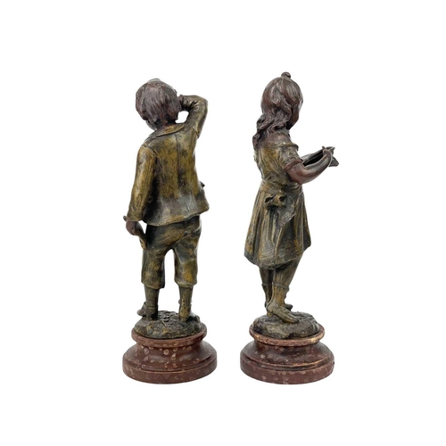 192 - A pair of French spelter figures of children. Late 19th century, titled 'Recompense' and 'Punition',... 