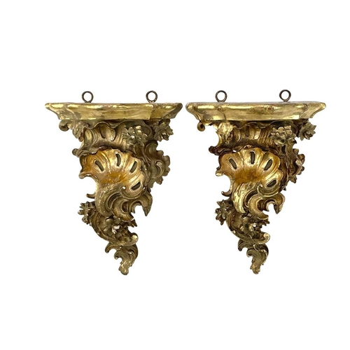 194 - A pair of rococo style composition gilt wall brackets. Height 17.5cm, together with a Champleve enam... 