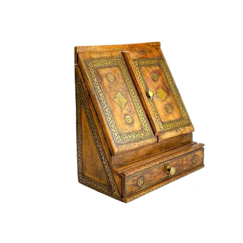 199 - A brass bound desk stationery box. In tropical hardwood, height 33.5cm width 31cm depth 17.5cm.