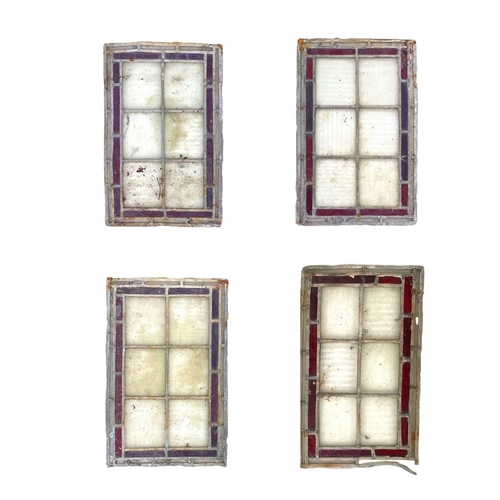 209 - A set of glass panels. 33cm x 21.5cm. (4)