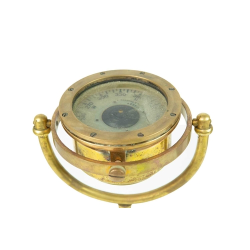 239 - A Cassens & Plath brass binnacle compass. On a gimbal stand, number 6275/4, height 27cm, diameter of... 