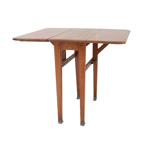 242 - A varnished teak twin flap table from a yacht. The inlaid top with removable gallery, and fitted a d... 