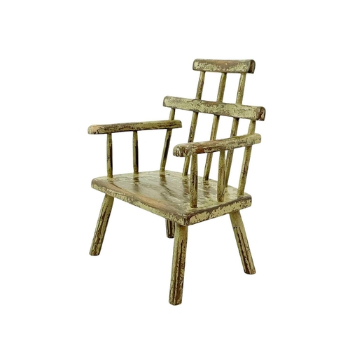 247 - A primitive painted Welsh style stick back Windsor chair. 19th/early 20th century, with a stepped to... 