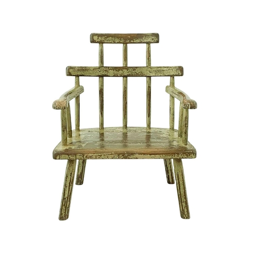 247 - A primitive painted Welsh style stick back Windsor chair. 19th/early 20th century, with a stepped to... 