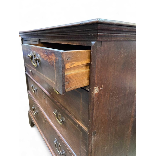 254 - An 18th century oak chest of drawers. With two short and three long drawers raised on bracket feet, ... 