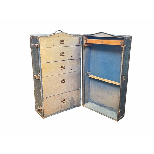 281 - A 1920s Innovation wardrobe steamer trunk. With applied metal label, fitted with drawers and hanging... 