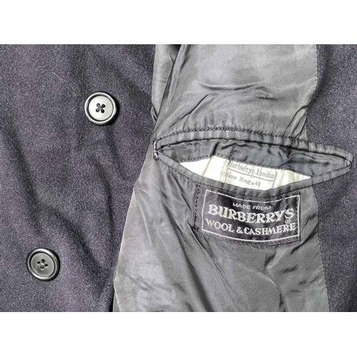 283 - A Burberry Gentleman's overcoat. Wool and Cashmere mix, size 41 reg together with three other Gentle... 