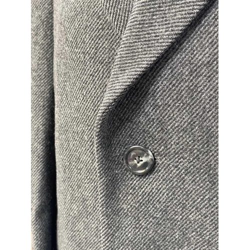 283 - A Burberry Gentleman's overcoat. Wool and Cashmere mix, size 41 reg together with three other Gentle... 