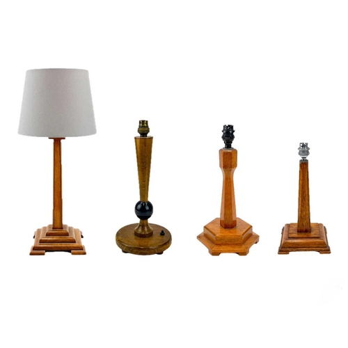 287 - A 1930s stained beech and ebonised table lamp. Height 35cm, together with a walnut square tapered ta... 